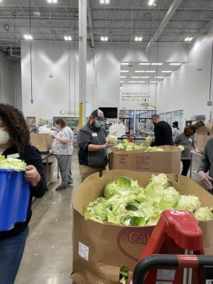 Success Computer Consulting team sharing food with the community